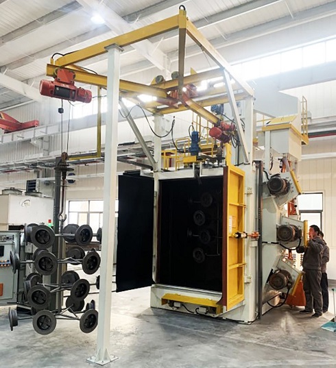How to load and unload safely when using a hook-type shot blasting machine to clean larger workpieces?
